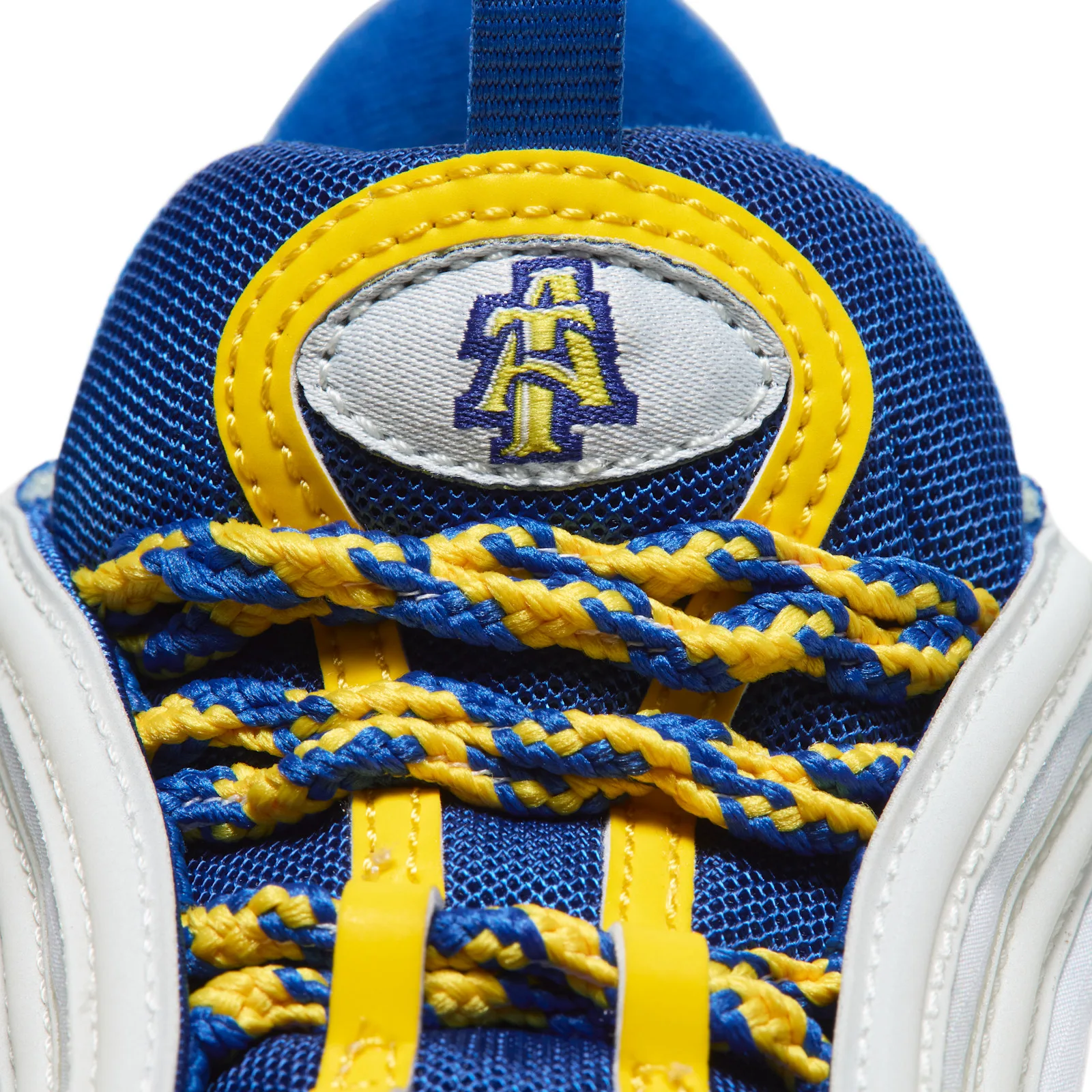 Tongue detail with an embroidered A&T logo and blue and yellow rope laces, NC A&T