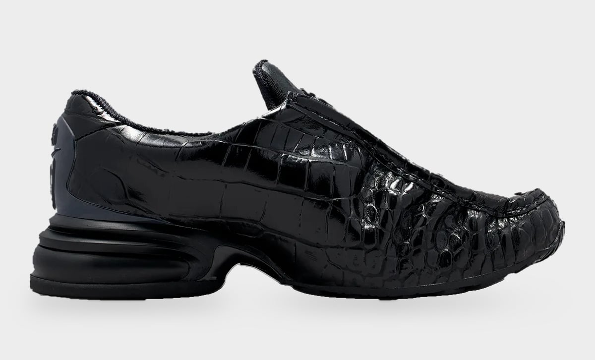 Lateral view of glossy black croc-embossed slip-on with black heel unit, Pearl Pink