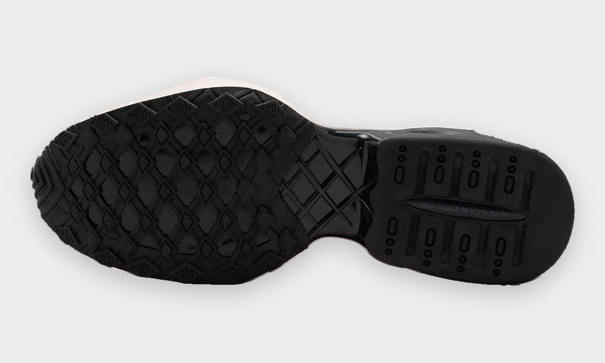 Outsole view, black diamond-lug tread and heel pod with 'Air Max Dolce' text, Pearl Pink