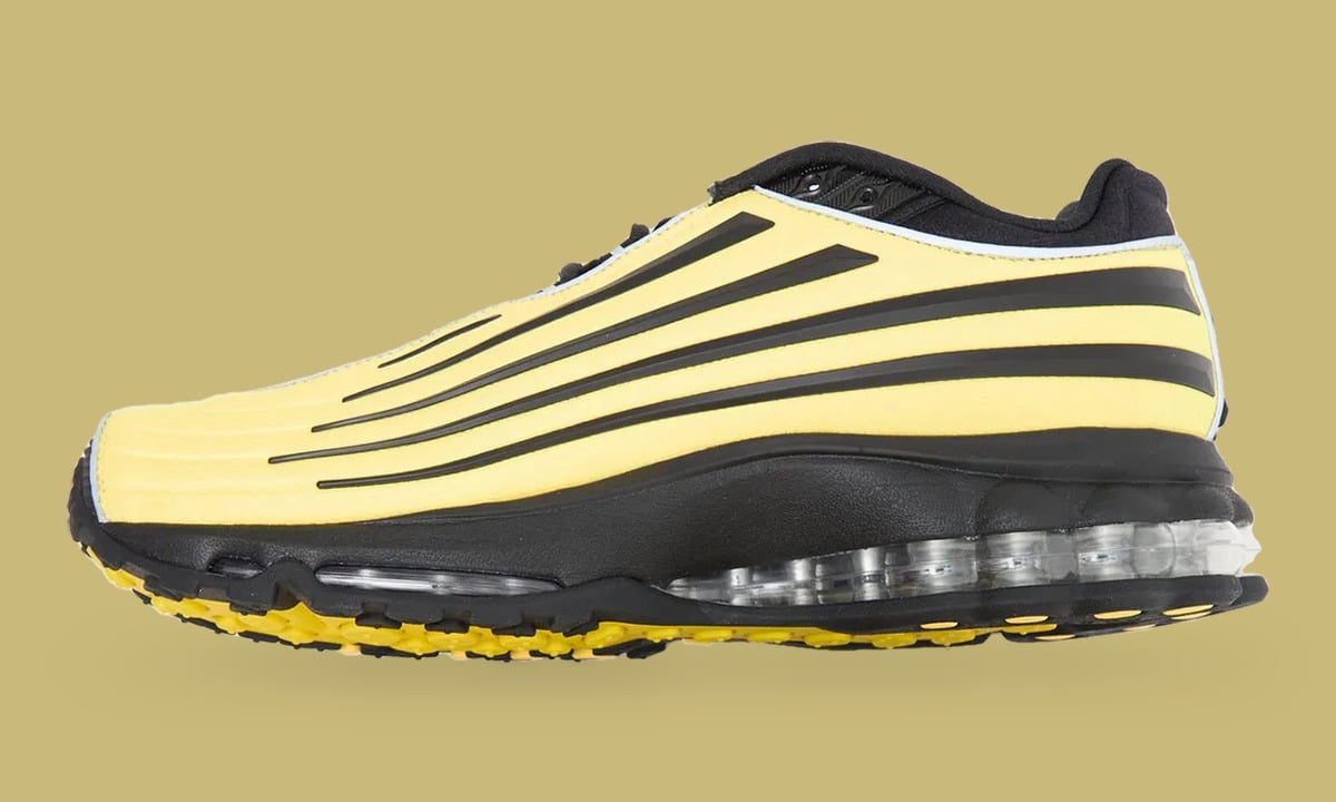 Lateral view showing yellow outsole lugs under black midsole and clear heel air unit, Citron