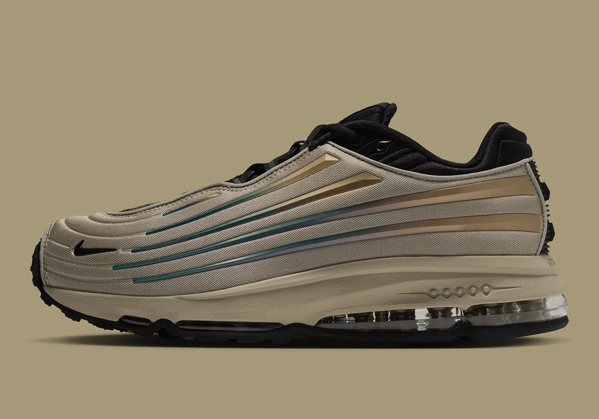 Lateral view on olive background, khaki upper with gold and teal stripes, clear heel Air unit, Desert Khaki