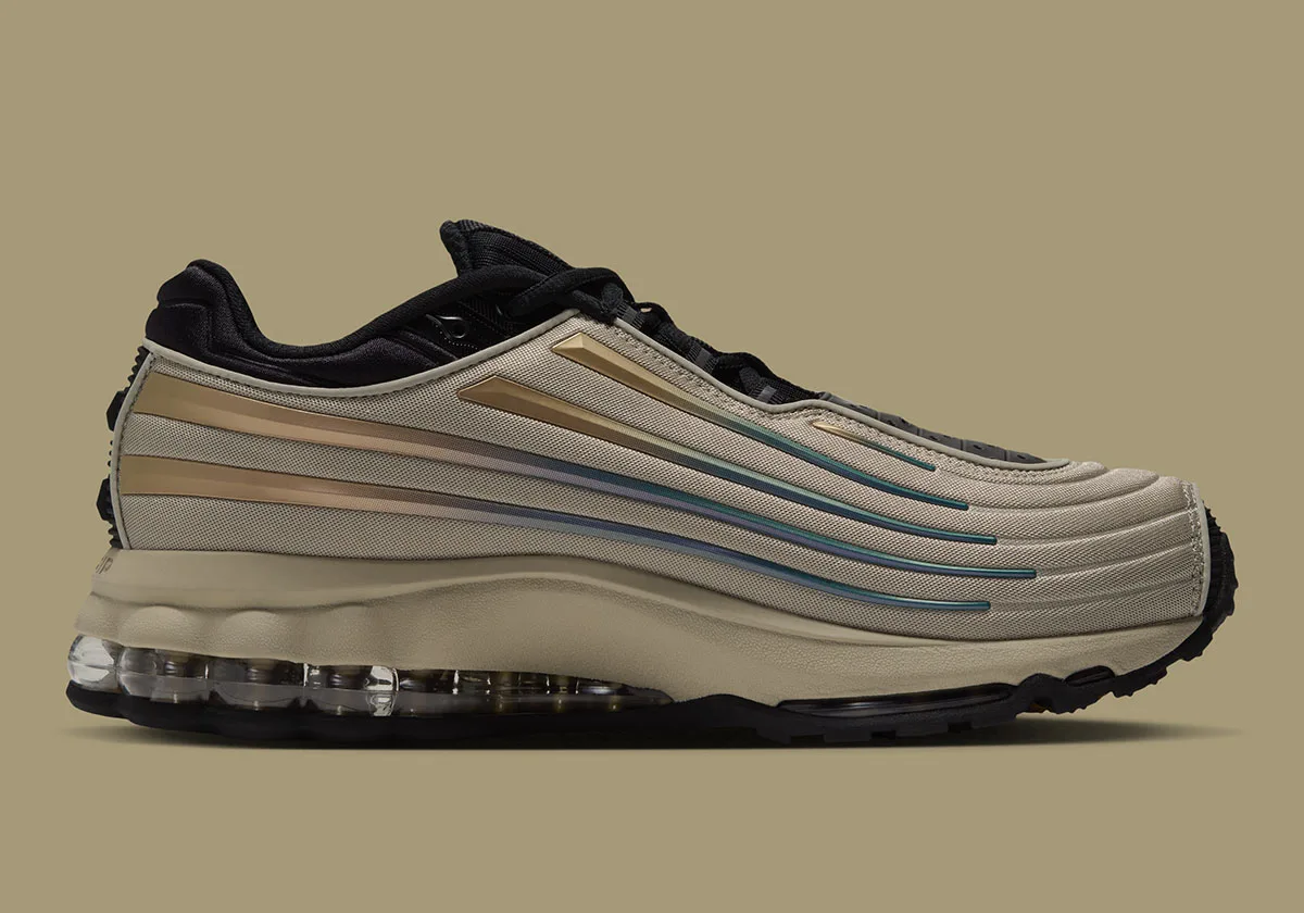 Medial view on olive background, khaki upper with gold stripes and visible clear heel air unit, Desert Khaki