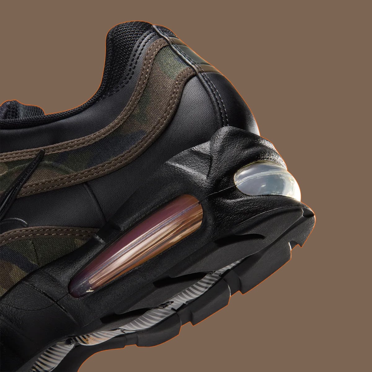Heel detail with camouflage fabric and a tinted visible Air unit, Camo