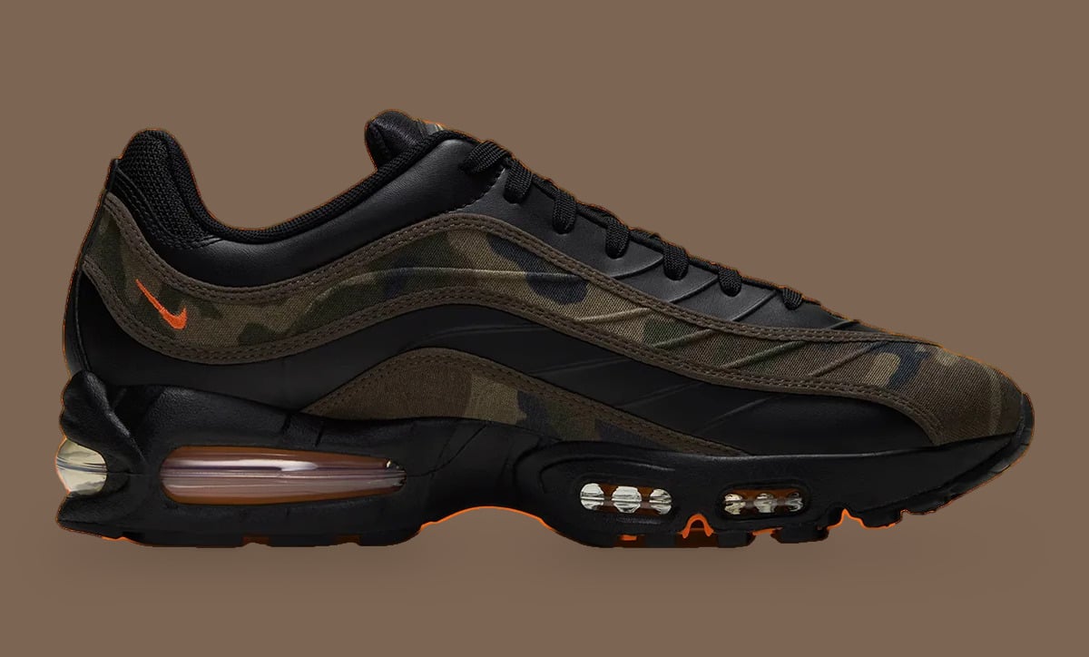 Medial view with camouflage panels and a small orange heel Swoosh, Camo