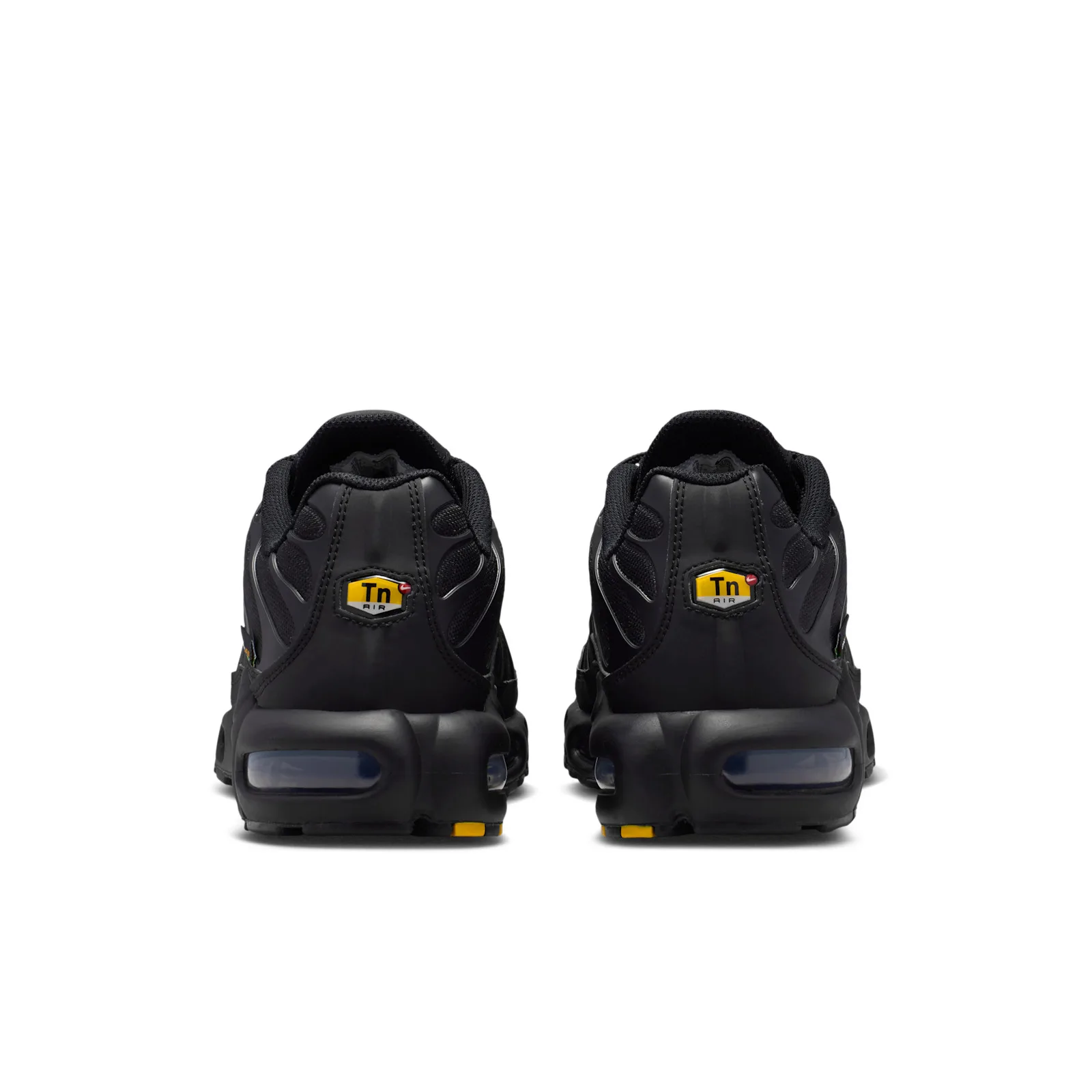 Heel view of pair, yellow and white Tn Air tabs and navy air windows on black heels, Max Plus Cordura