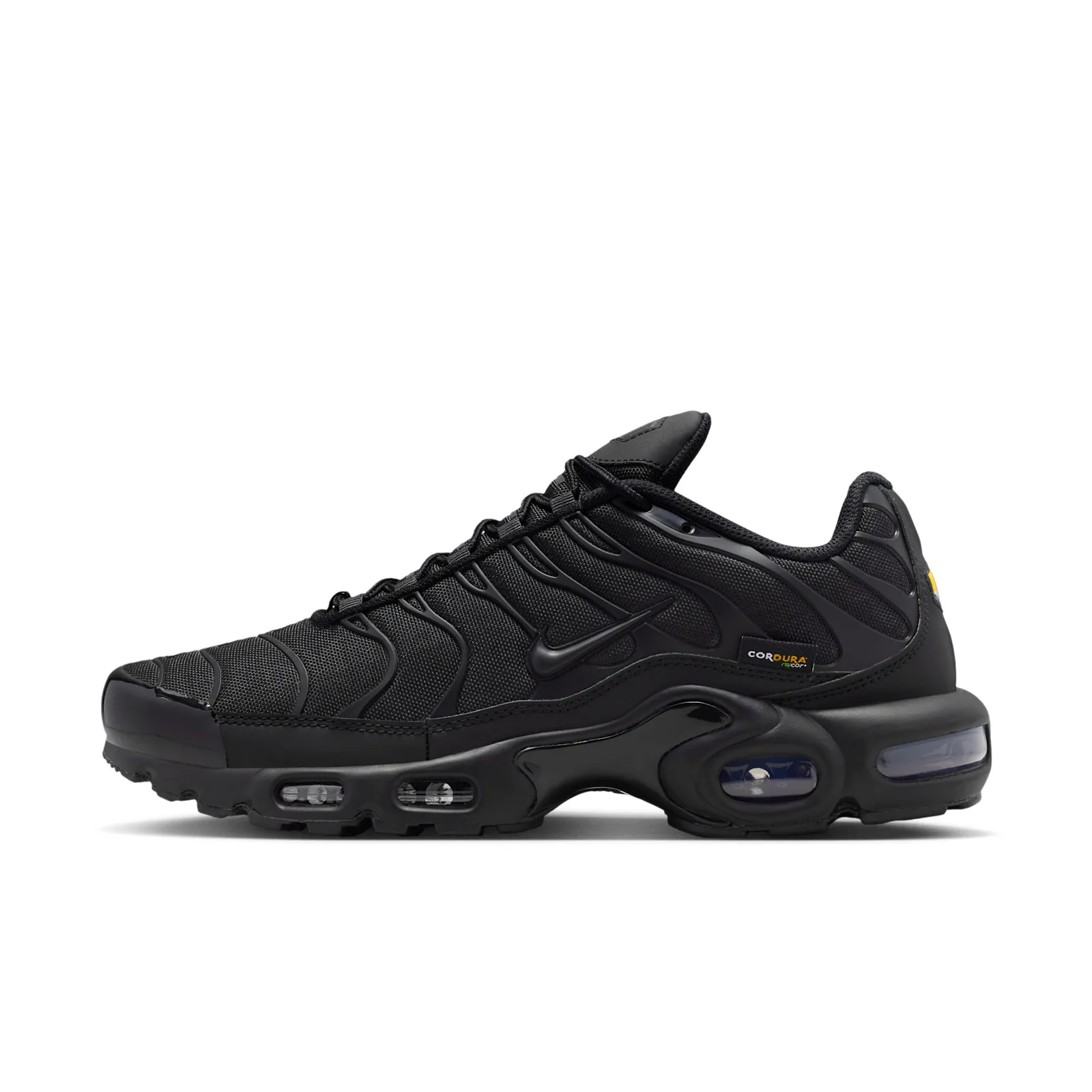 Lateral view on white, all-black mesh upper, small Cordura tag and navy heel air window, Max Plus Cordura