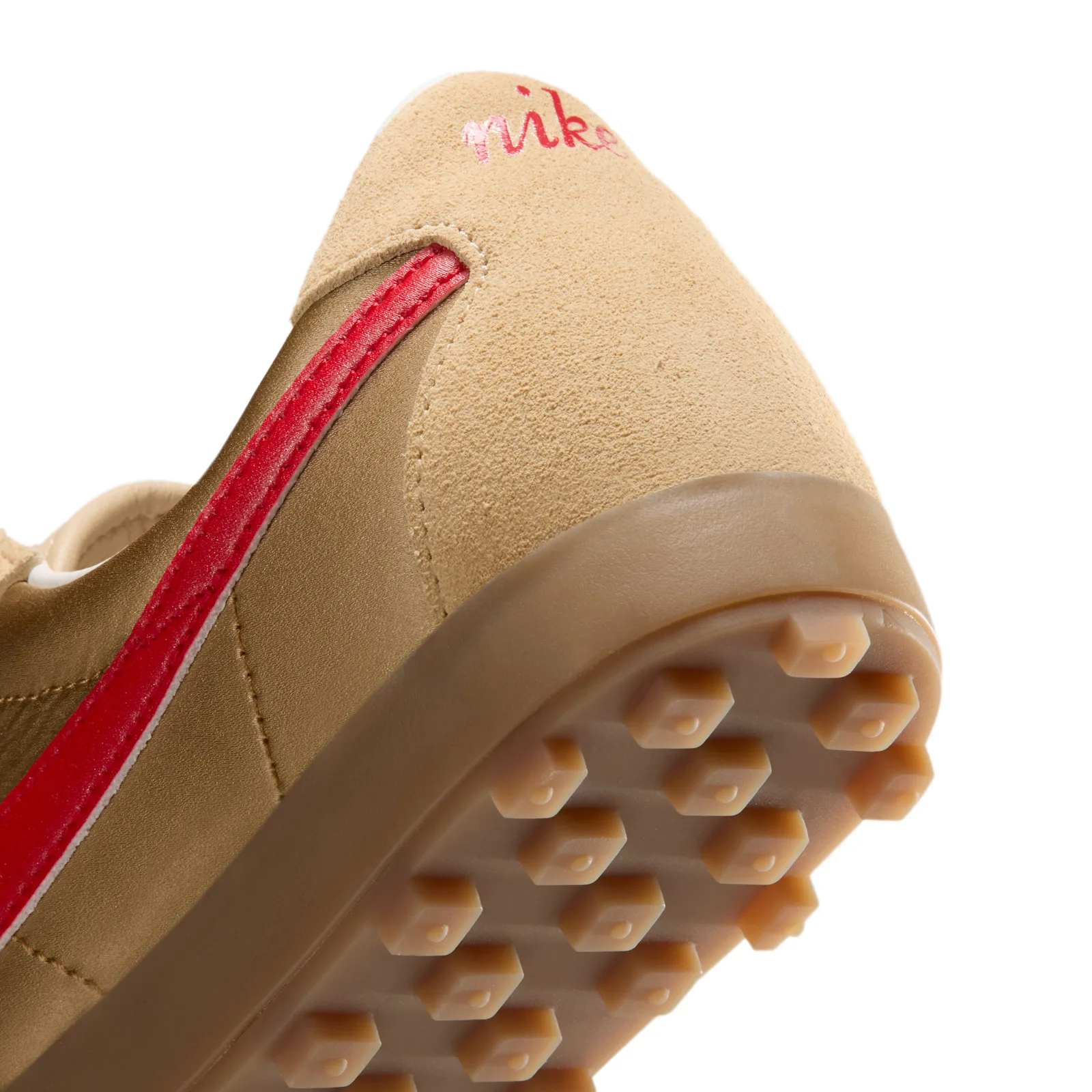 Detail of the tan suede heel with red script nike, red swoosh edge and hexagonal gum studs, NFL Pack