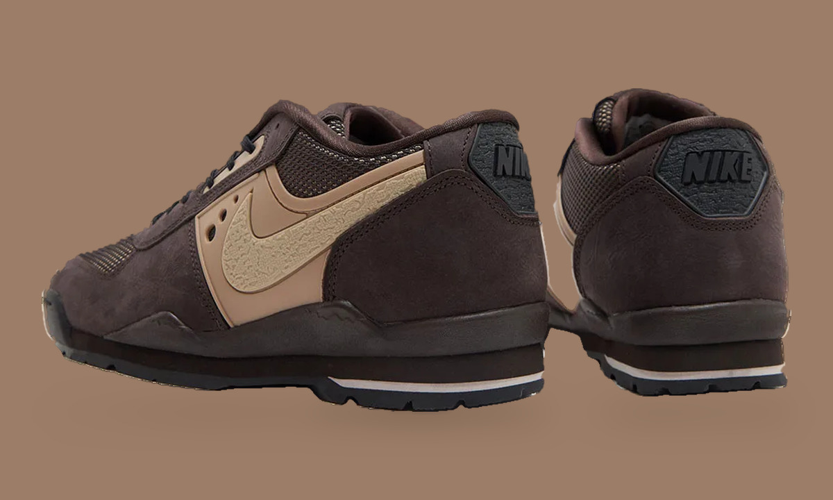 Heel and rear-quarter view of brown pair, black NIKE heel tabs, tan Swoosh, Nike Baltoro Low