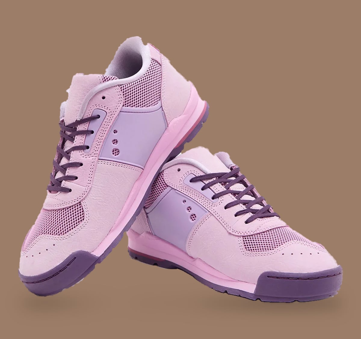 Stacked pair of pink sneakers, lilac side panels and purple laces and toe caps, Nike Baltoro Low