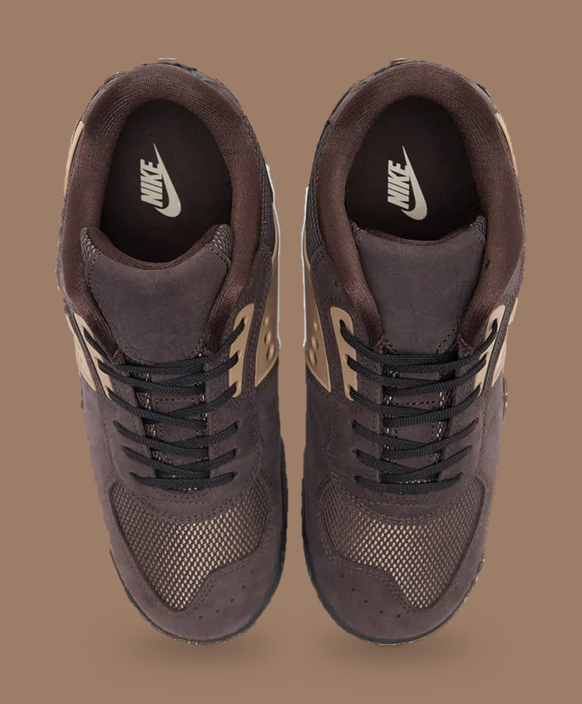 Top-down view of brown pair with black laces and cream Nike logos on insoles, Nike Baltoro Low