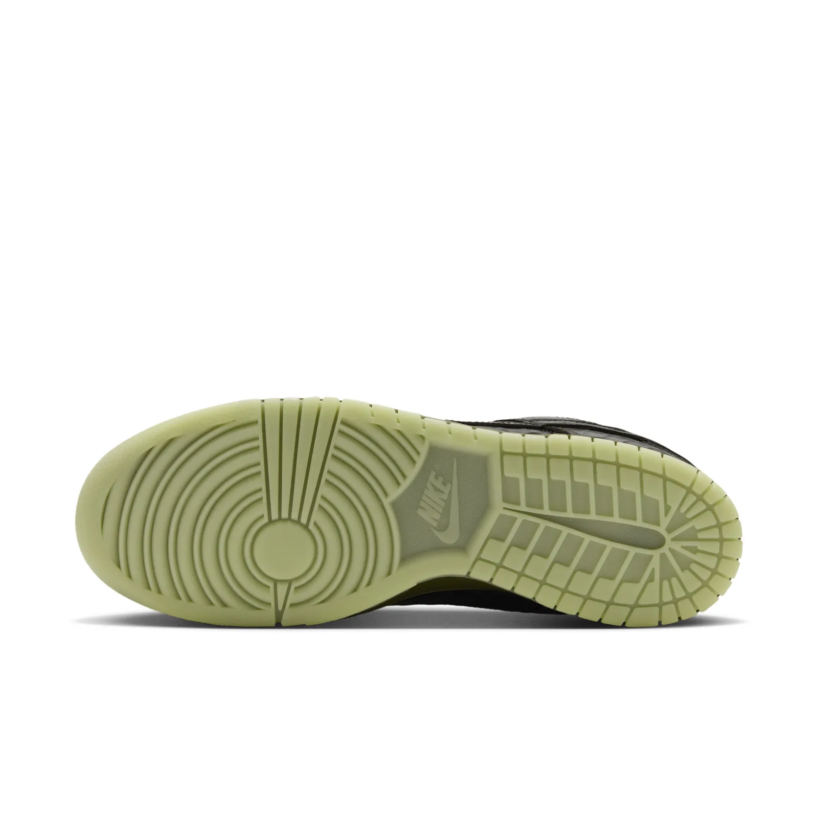 Outsole view with pale green tread and a Nike logo at the midfoot, Halloween