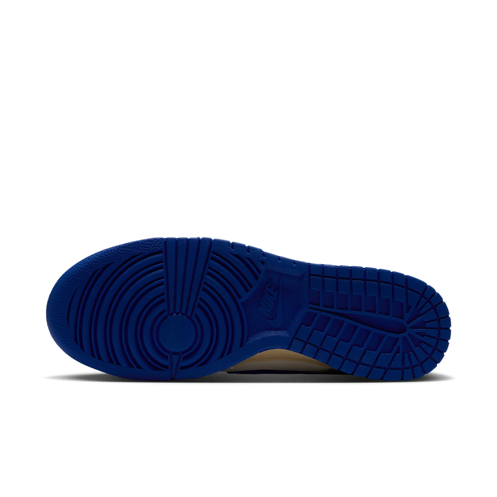 Blue outsole with circular forefoot tread and molded Nike logo, Jade Stone