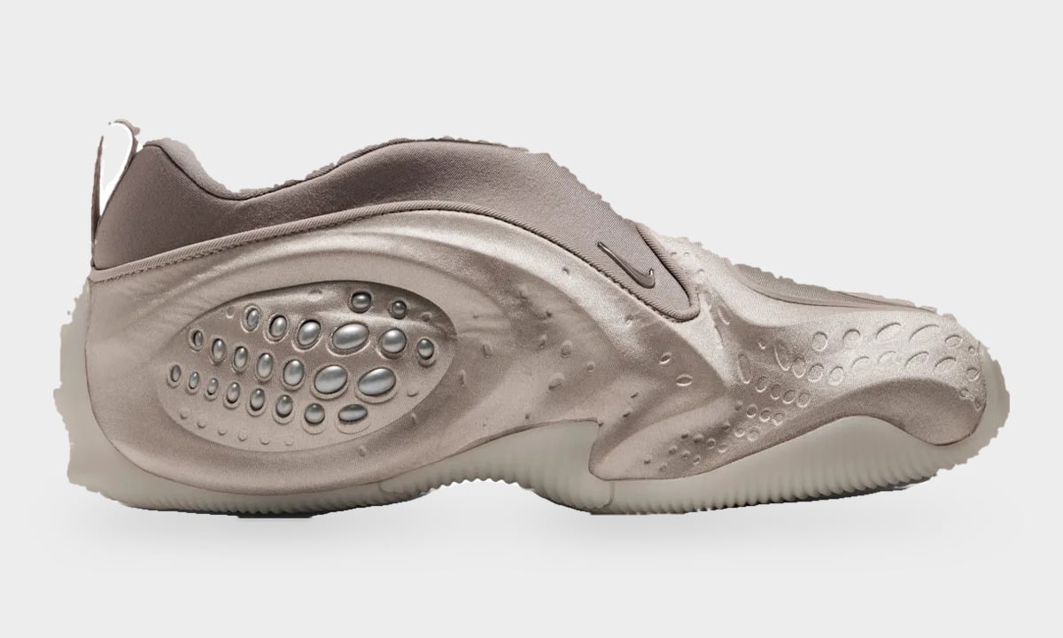 Medial view, taupe stretch collar, silver beads on heel panel and small swoosh by the ankle, Cream II