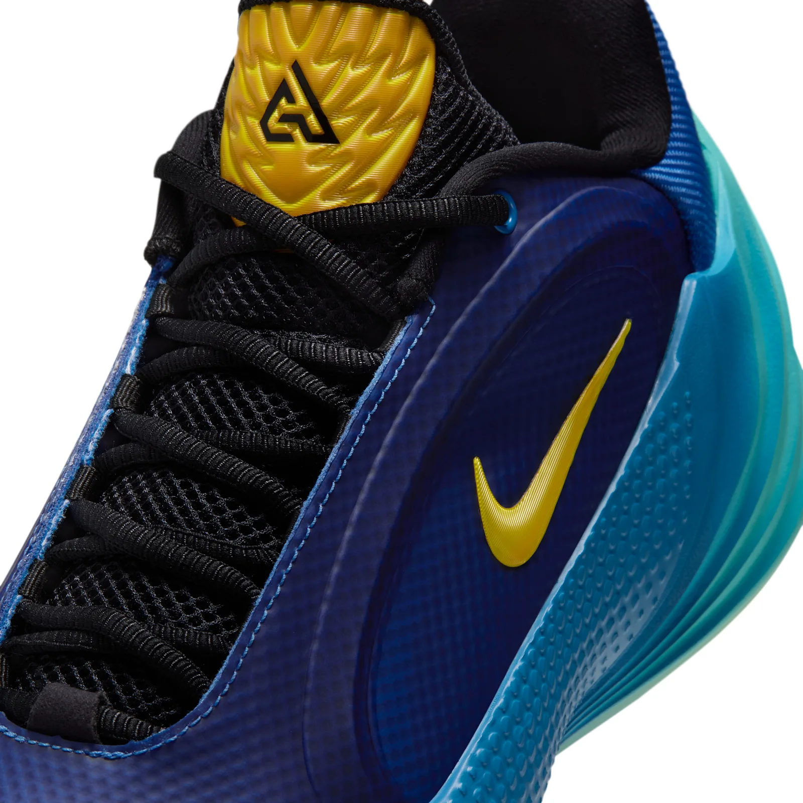 Upper detail with black mesh lacing, a yellow tongue logo and yellow Swoosh, Star Blue