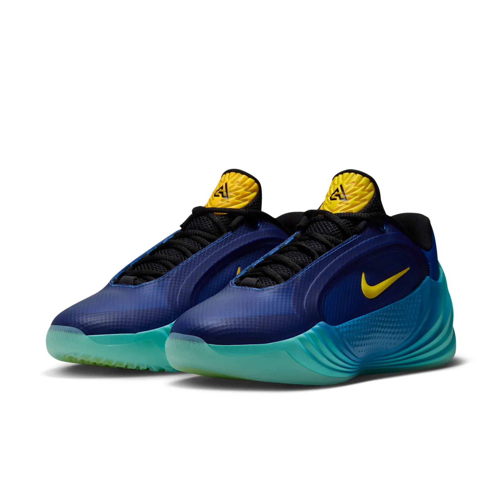 Pair at a front angle with dark blue uppers and yellow tongue logos, Star Blue