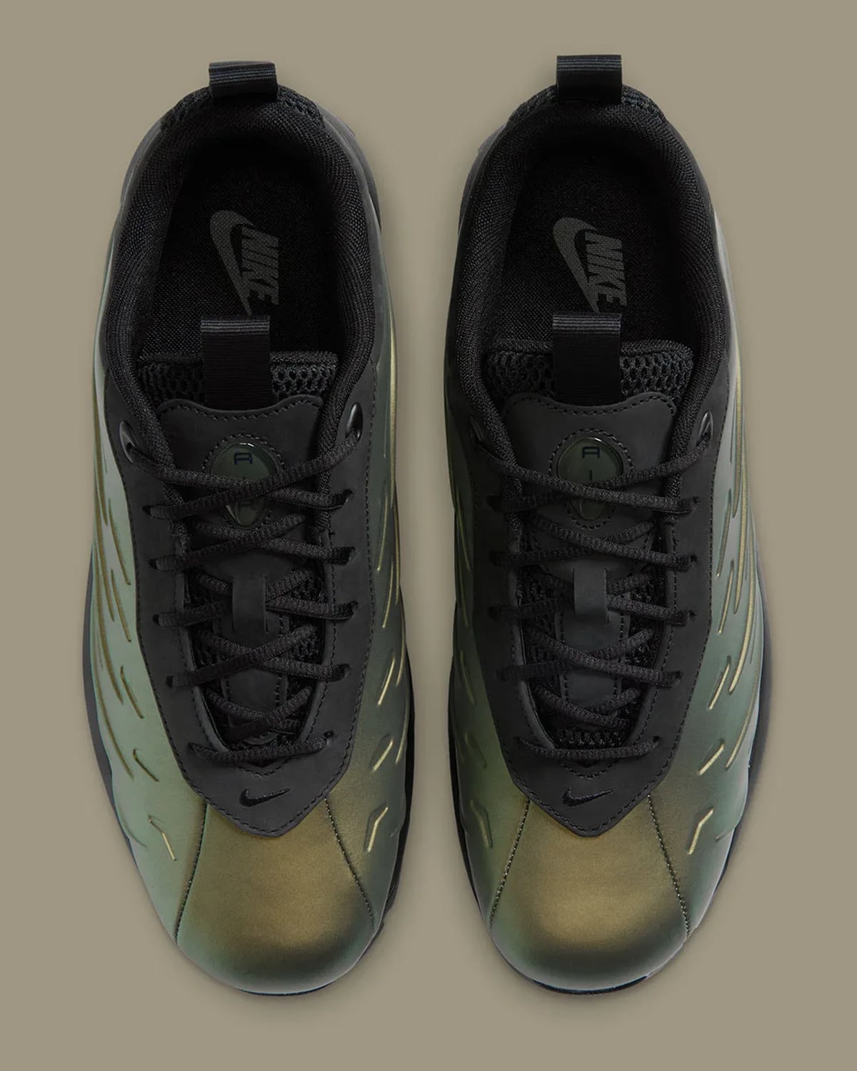 Top-down view of pair, black laces, iridescent toe boxes, Nike text on insoles, Metallic Gold