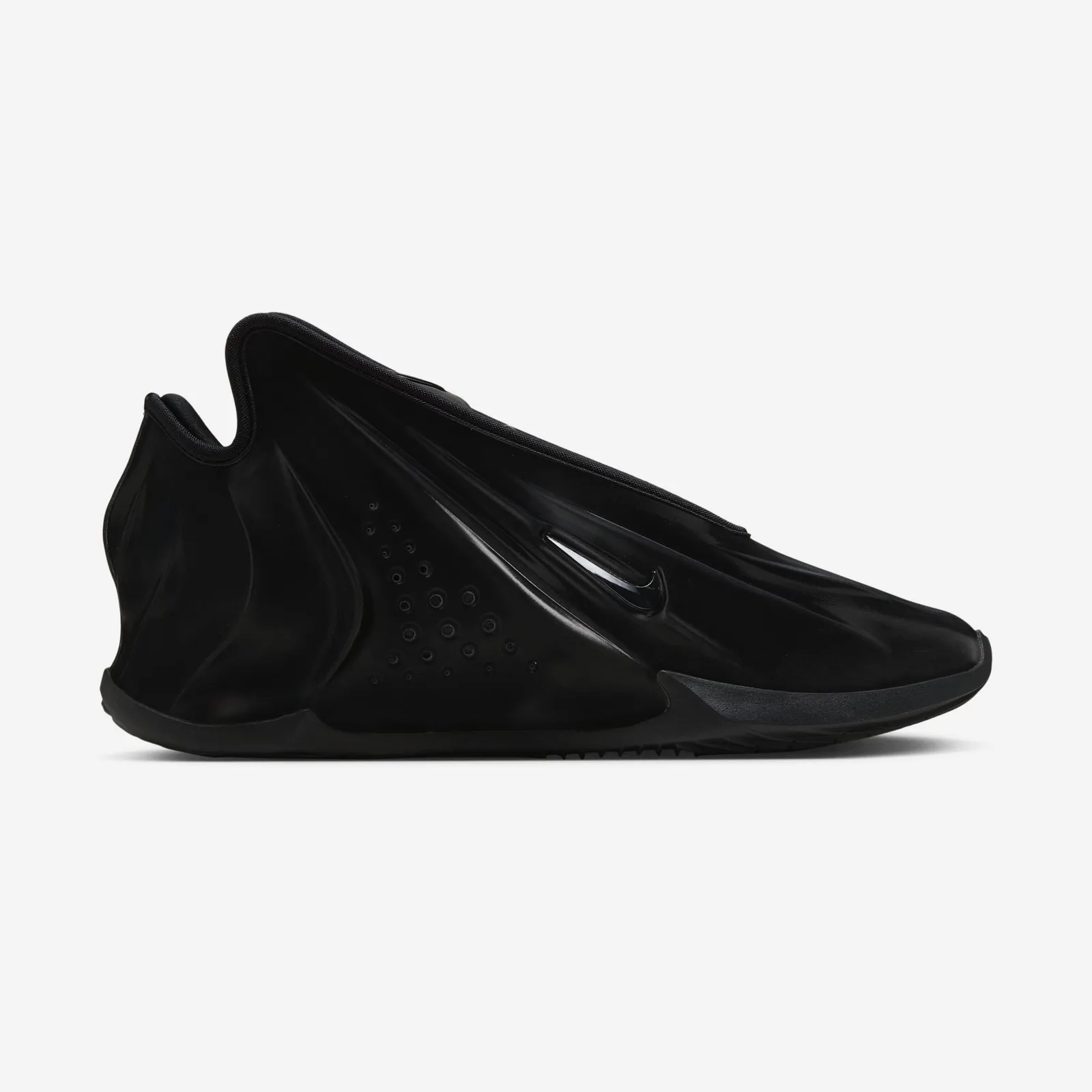 medial view, perforated dot panel near midfoot, black swoosh, white background, Triple Black