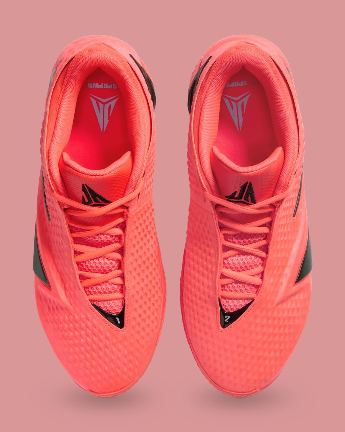 Top-down pair with coral laces, black tongue logos and red insoles, Code Red