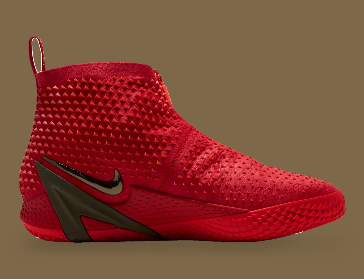 Medial view of red studded high-top with bronze swoosh and dark olive heel clip, Zombie