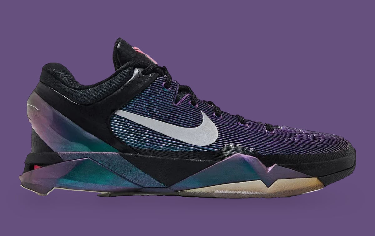 Medial view, iridescent heel clip, grey swoosh, cream midsole on purple backdrop, Invisibility Cloak