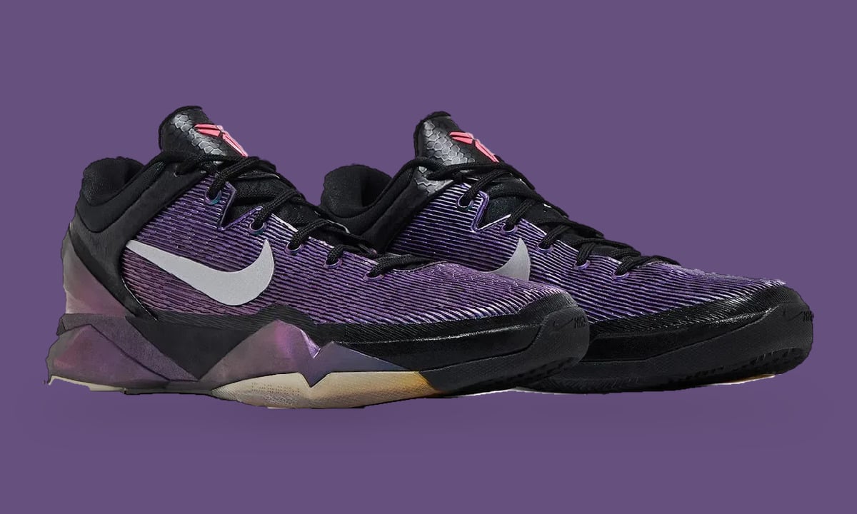 Pair at three-quarter angle, ribbed purple uppers, grey swoosh, black toe cap, Invisibility Cloak