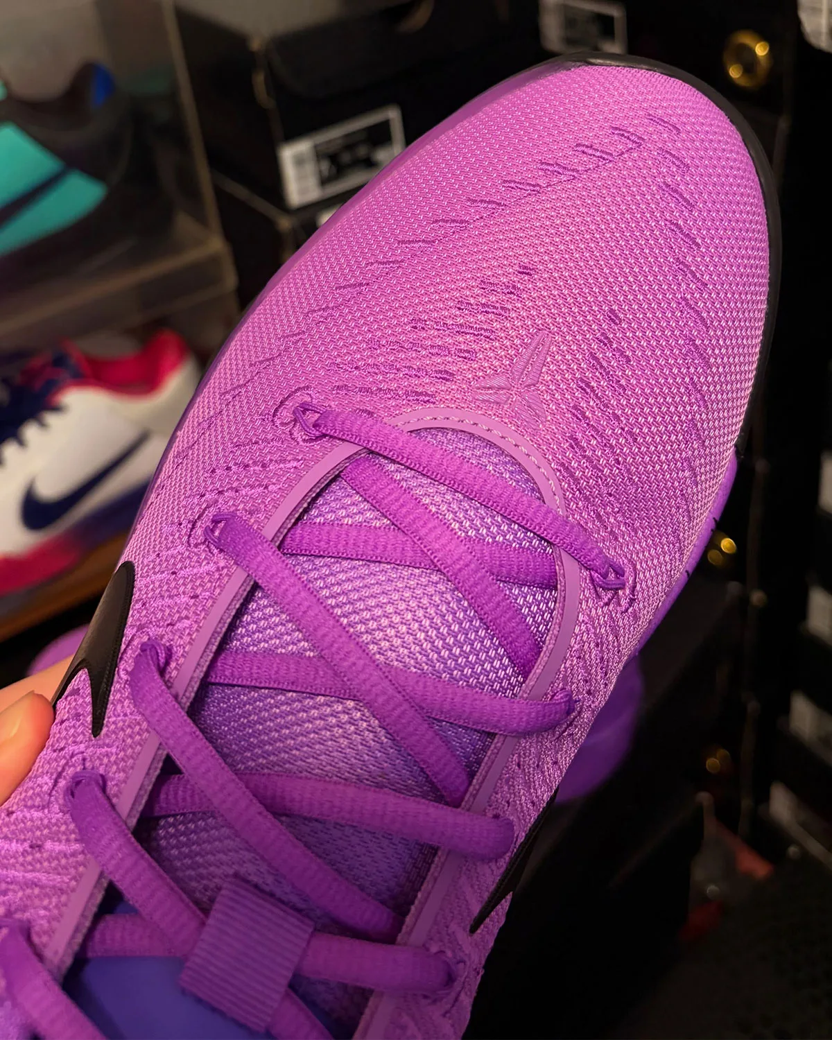 Toe close-up, knit purple upper with tonal ghost logo and crossed laces, Purple Stardust
