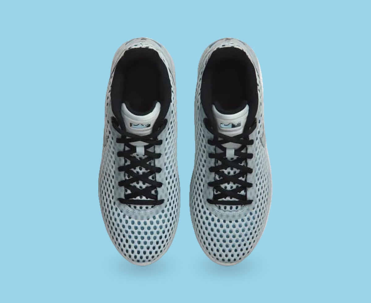 Top-down view of pair, black laces and collar, pale mesh with dark teal perforations, Fiberglass