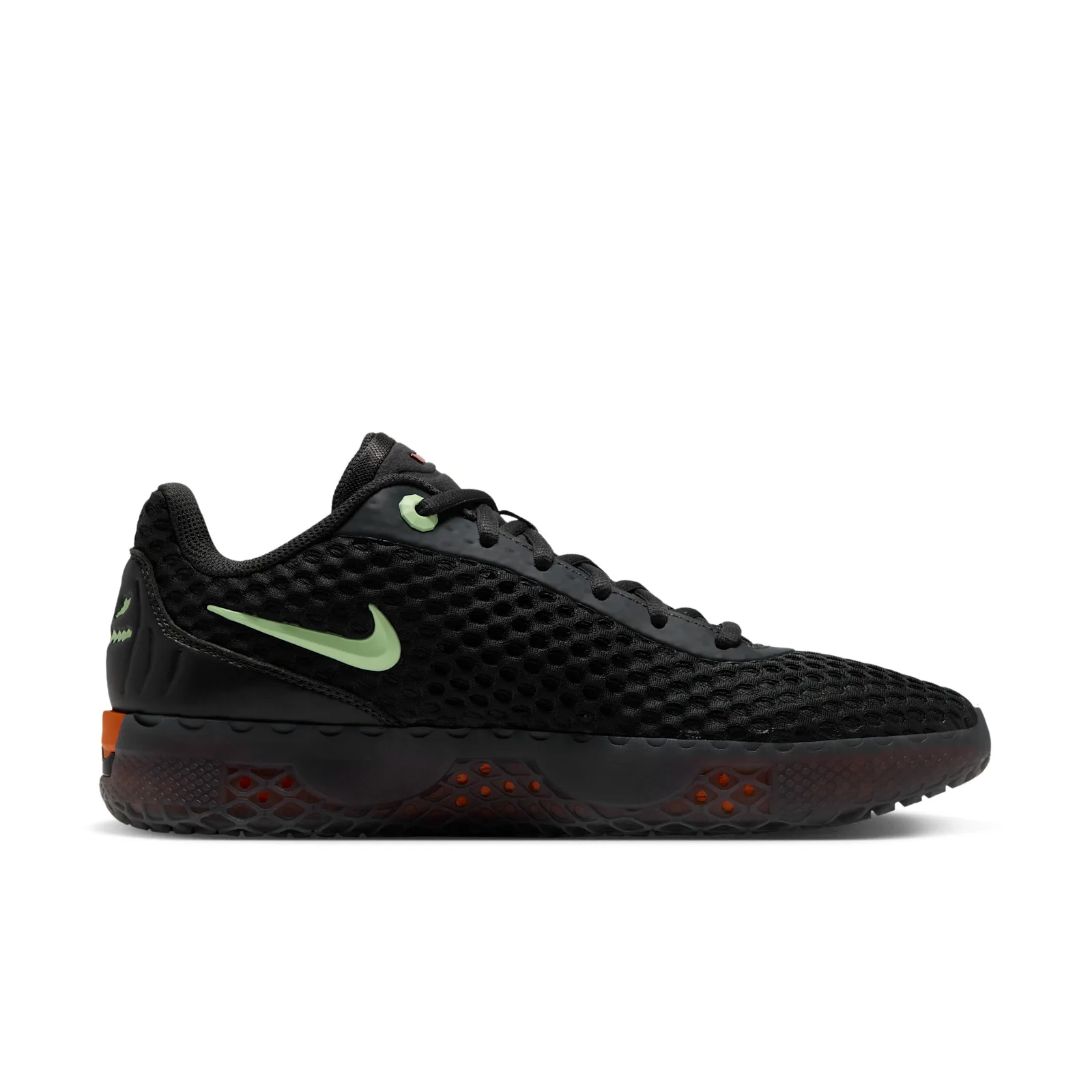 Medial view with a pale green Swoosh and orange accents in the dark sole, Halloween