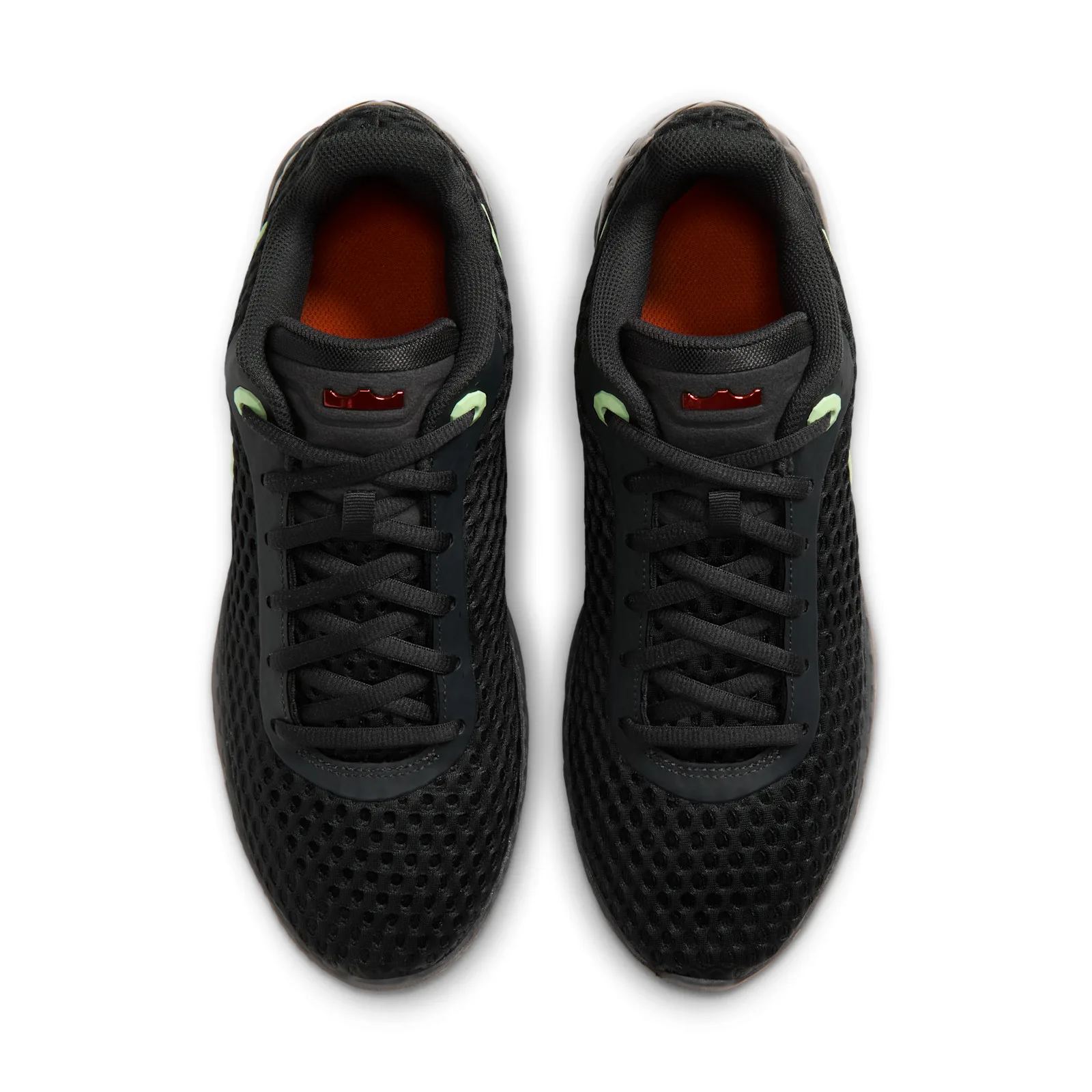 Top-down view of pair with black laces, orange insoles and red tongue logos, Halloween