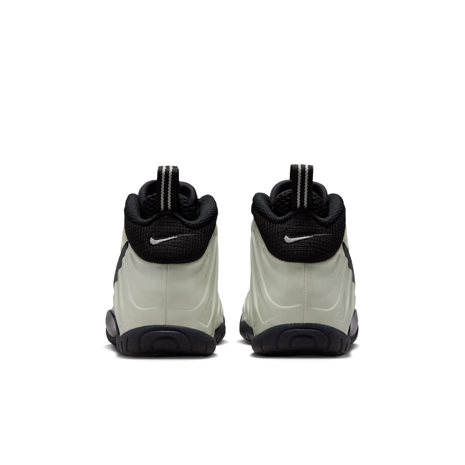 Heel view of pair, black collars with small silver swooshes and striped pull tabs, Glow In The Dark