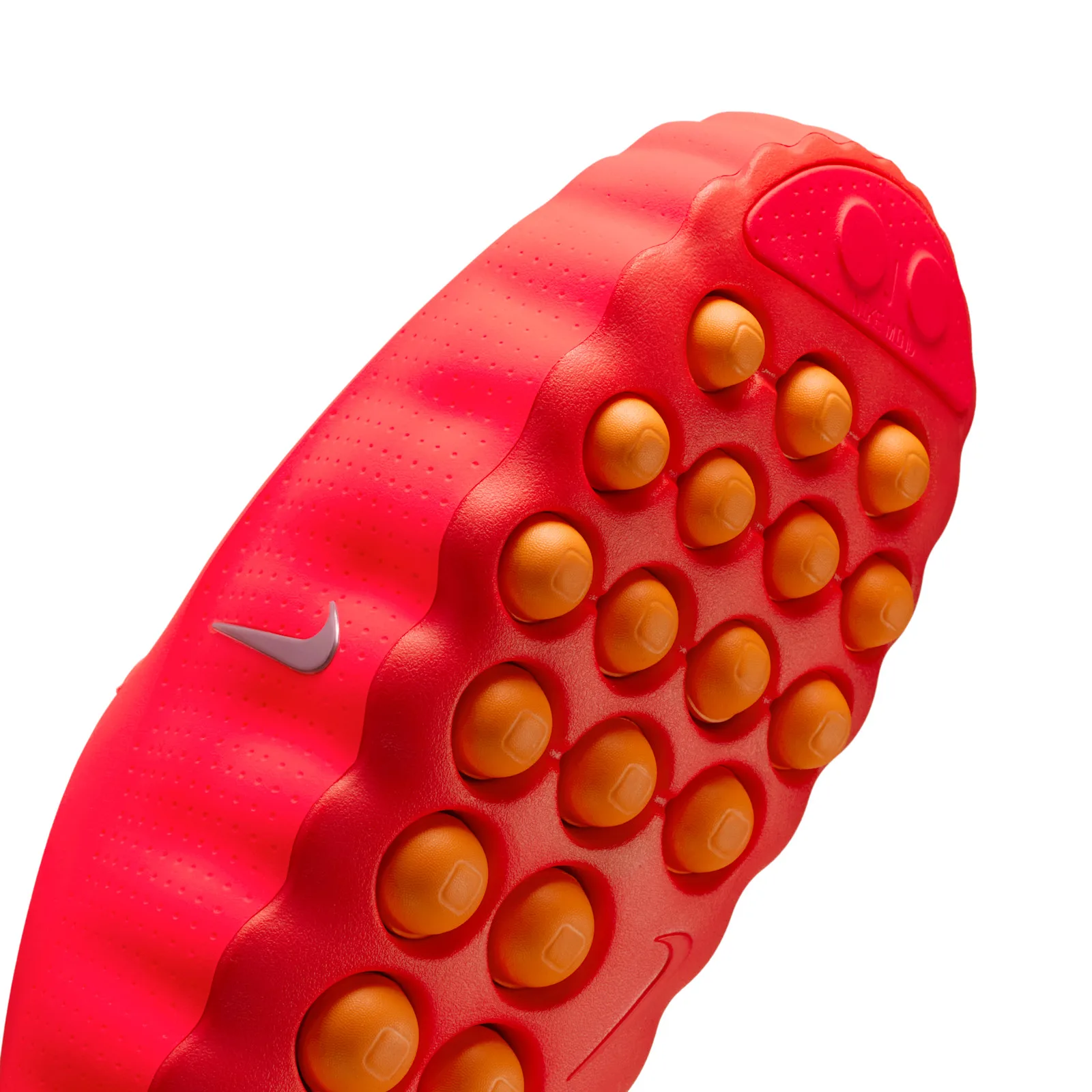 angled outsole close-up, orange studs and embossed swoosh on red sole, Solar Red