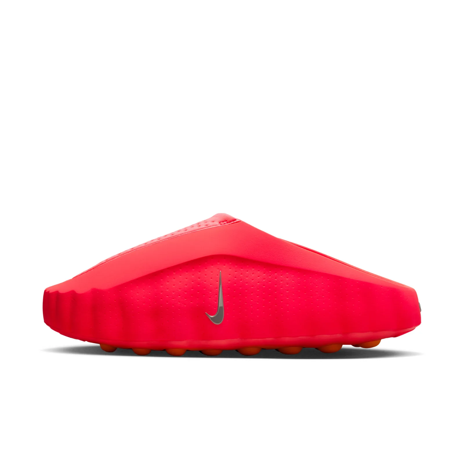 lateral view, red mule showing ridged outsole edge and metallic swoosh, Solar Red