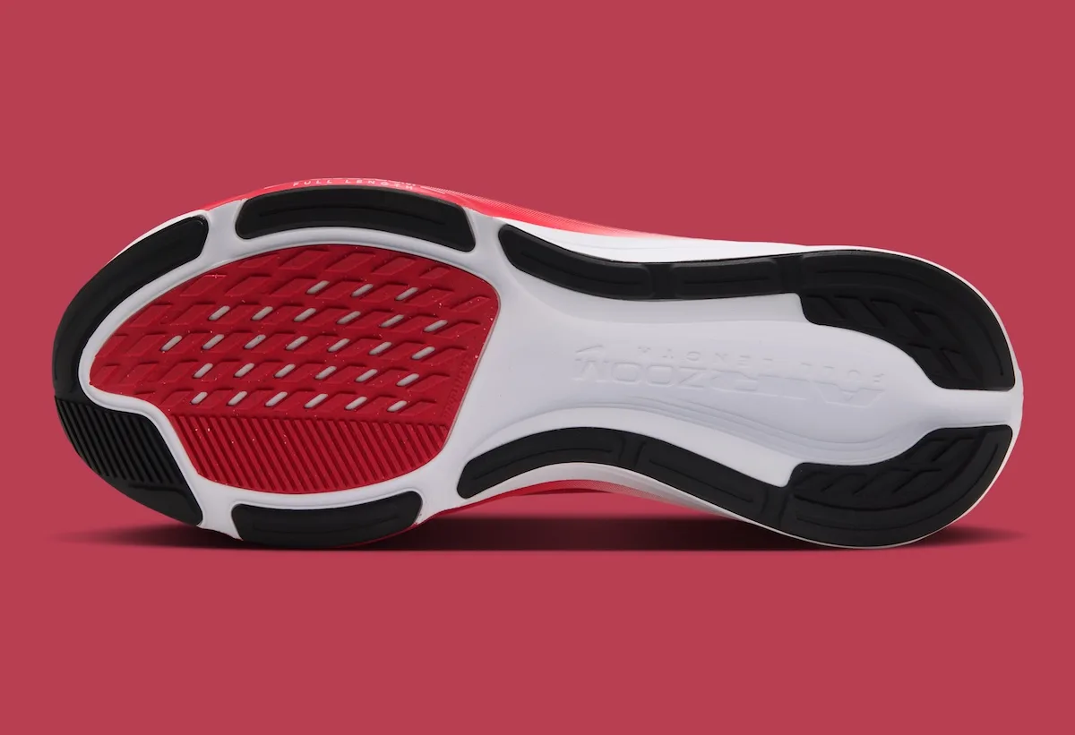 outsole view, red and black waffle tread with Air Zoom text, Canada