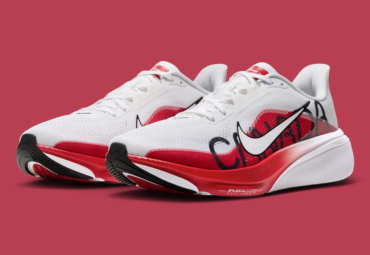 angled front pair view, white and red uppers with black soles on red backdrop, Canada