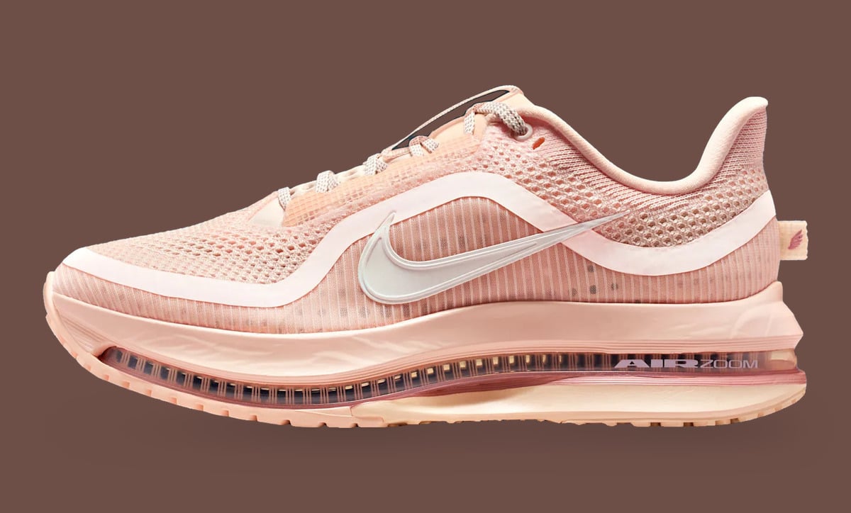 Lateral side, pale pink mesh with white swoosh and "Air Zoom" air unit on brown, Guava Ice