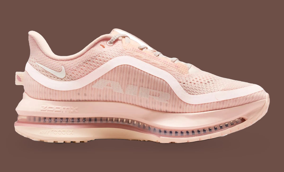 Medial side, pale pink mesh with large "AIR" lettering and clear air unit on brown, Guava Ice