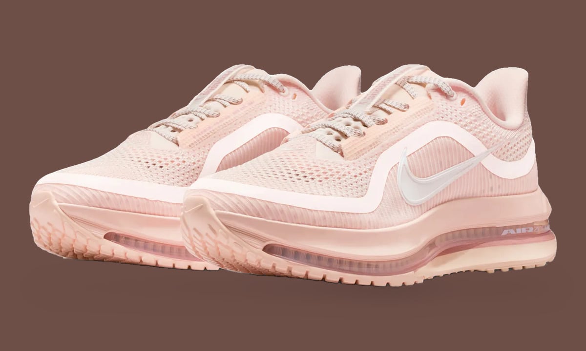Pair, three-quarter view, pale pink mesh with white swoosh and air unit on brown, Guava Ice