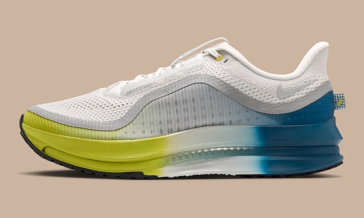 Lateral view, white mesh upper, grey Swoosh and midsole fading from yellow-green to blue, The Perfect Texture For Running