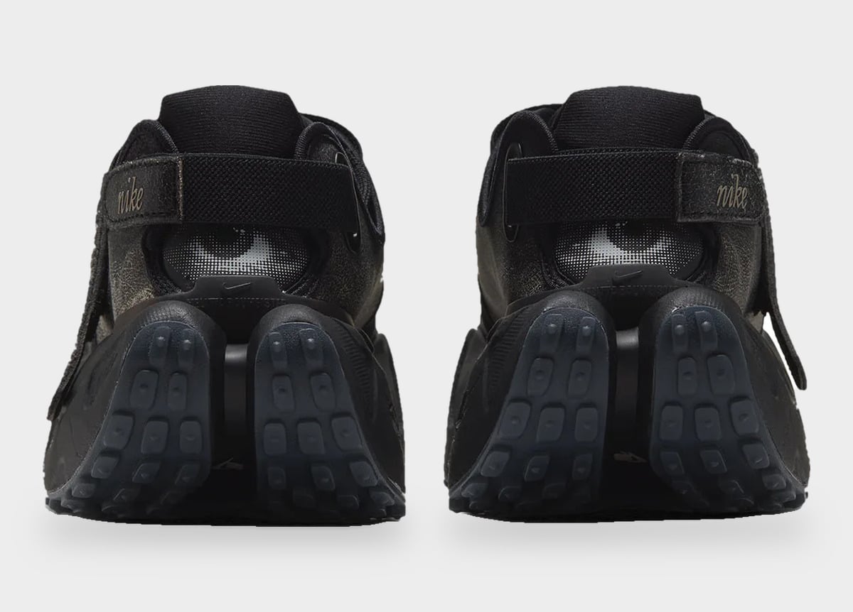 Heel view of pair with black straps, script Nike logos and divided soles, Nike Rift Rocker