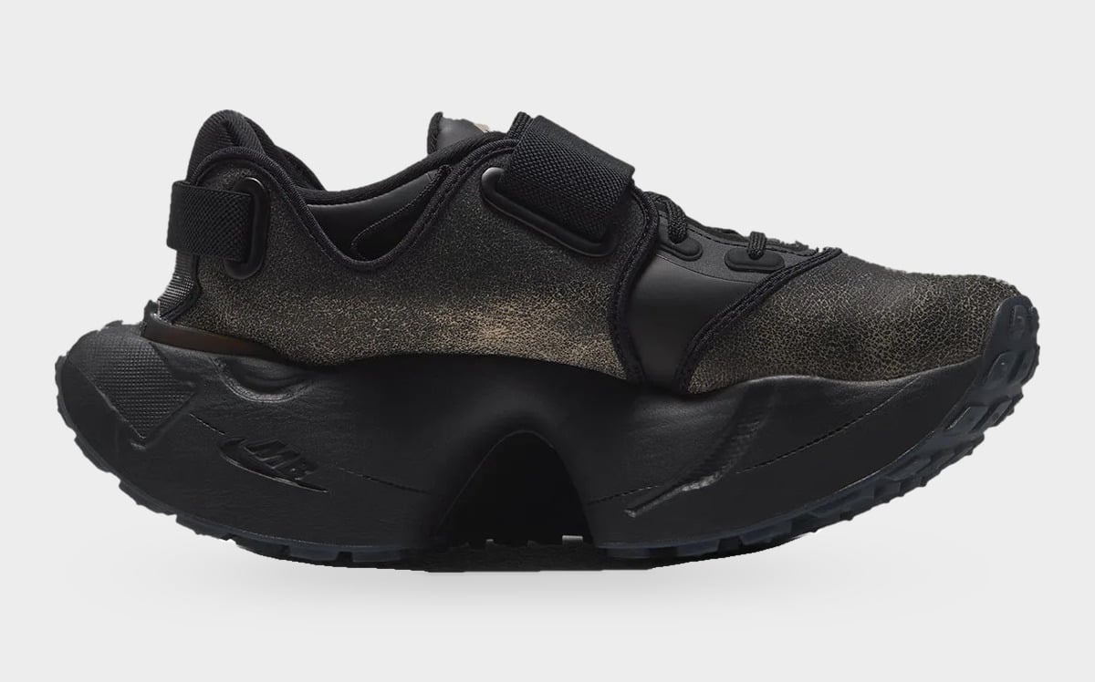 Medial view with a mottled dark upper and deeply sculpted black sole, Nike Rift Rocker