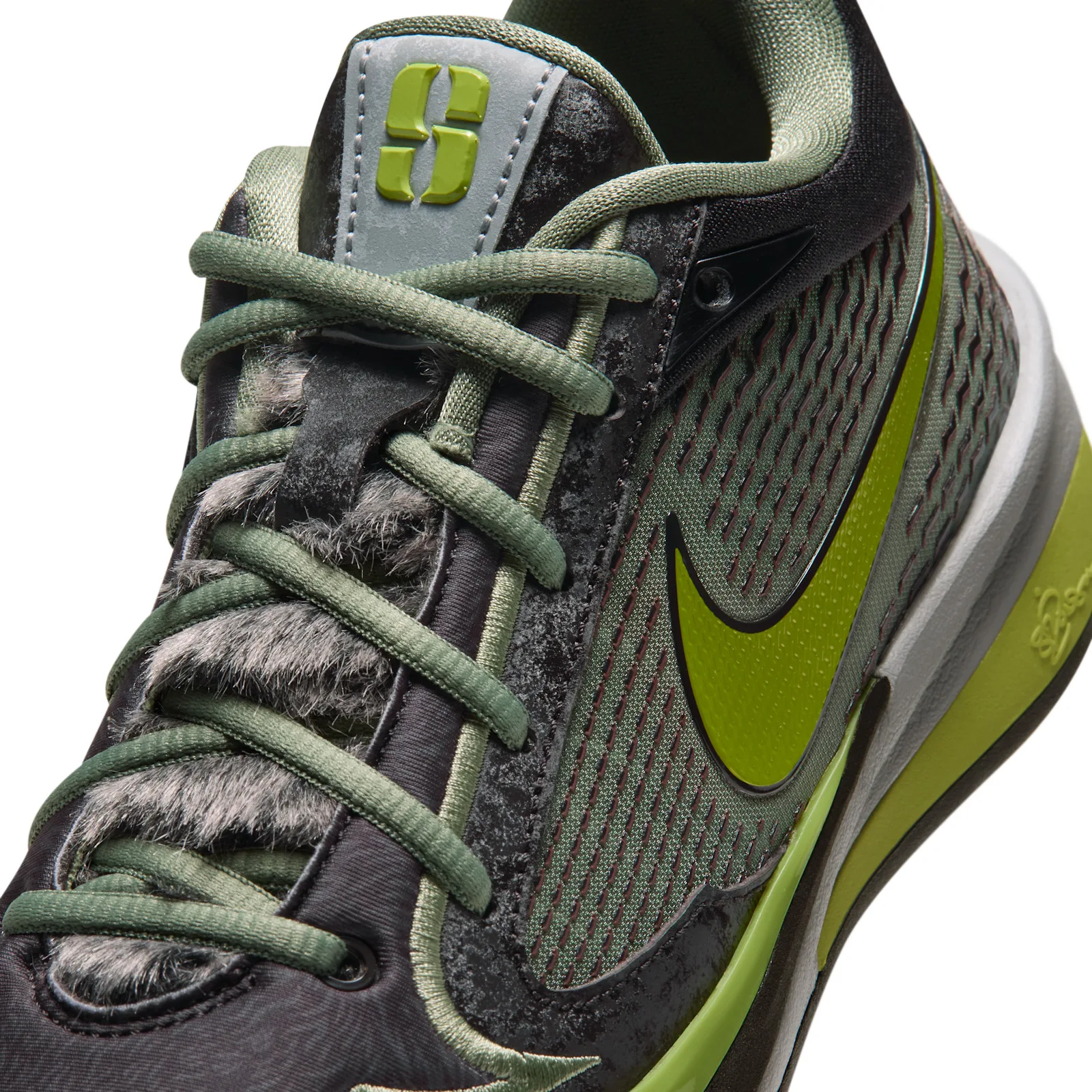 Tongue detail with grey fur, olive laces and lime Swoosh on patterned mesh, Moon Ball