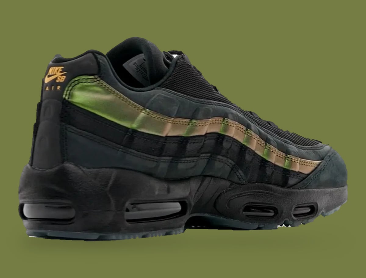 Rear three-quarter view, gold Nike SB Air heel text and green iridescent panel, x Kyle Wilson
