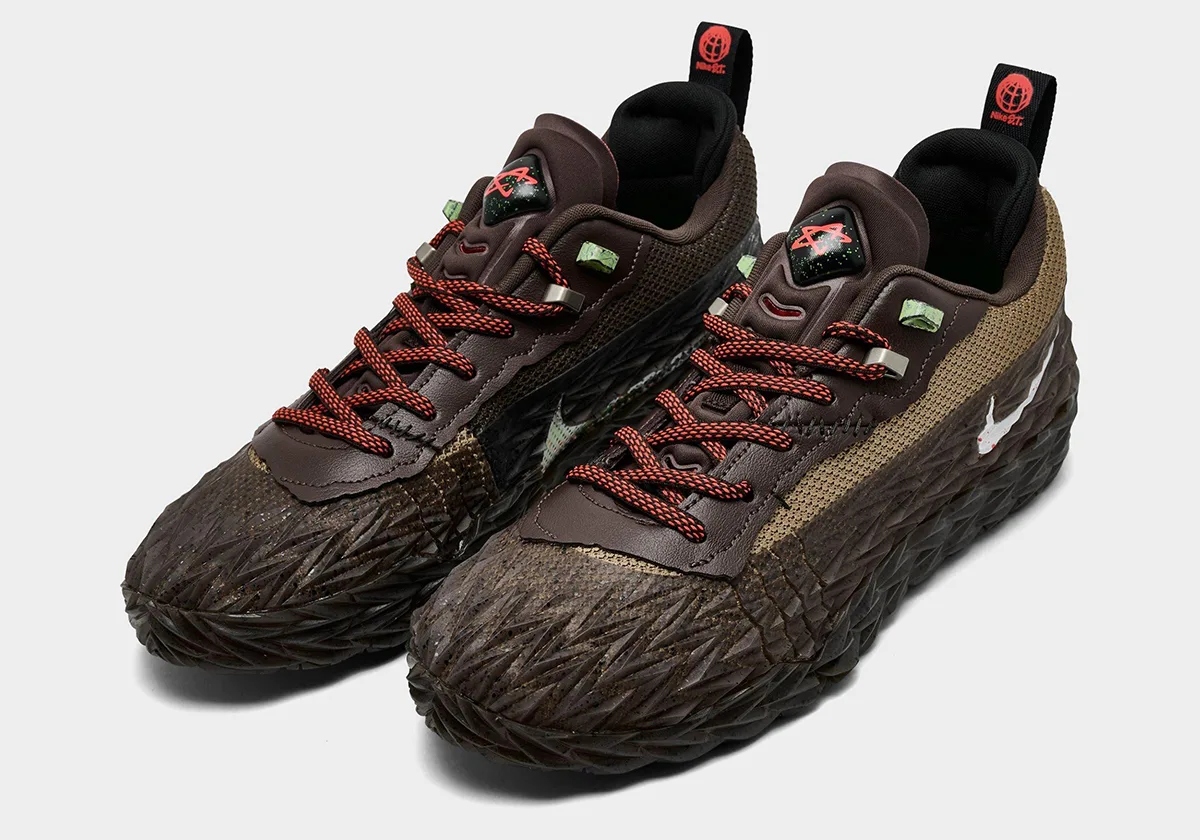 Pair from the front angle, brown spiky midsole, red laces, green lace charms, Halloween