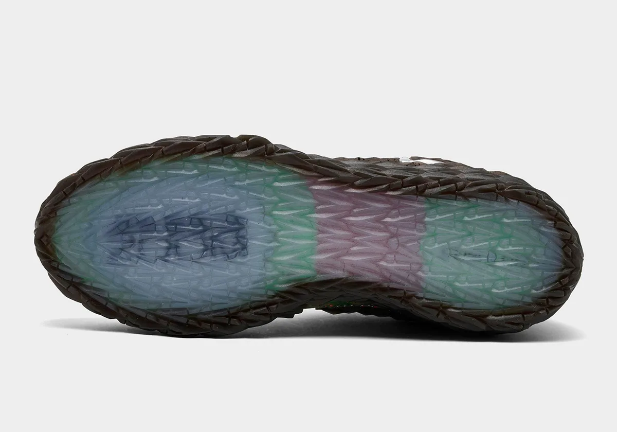 Outsole view with translucent blue, green and purple zones, brown spiky rim, Halloween