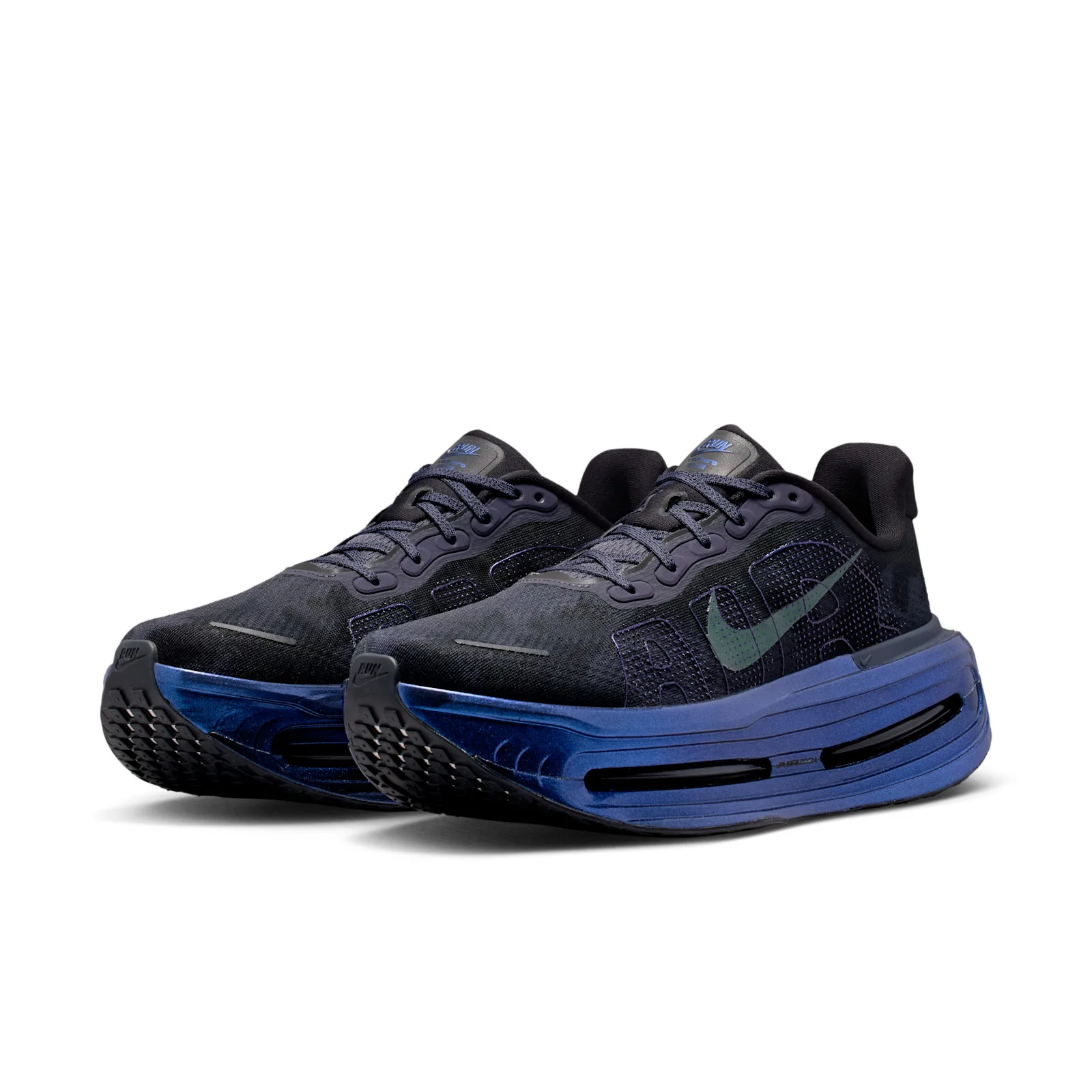 Pair at three-quarter angle, black mesh uppers with blue midsoles and visible black outsole tread, Gridiron