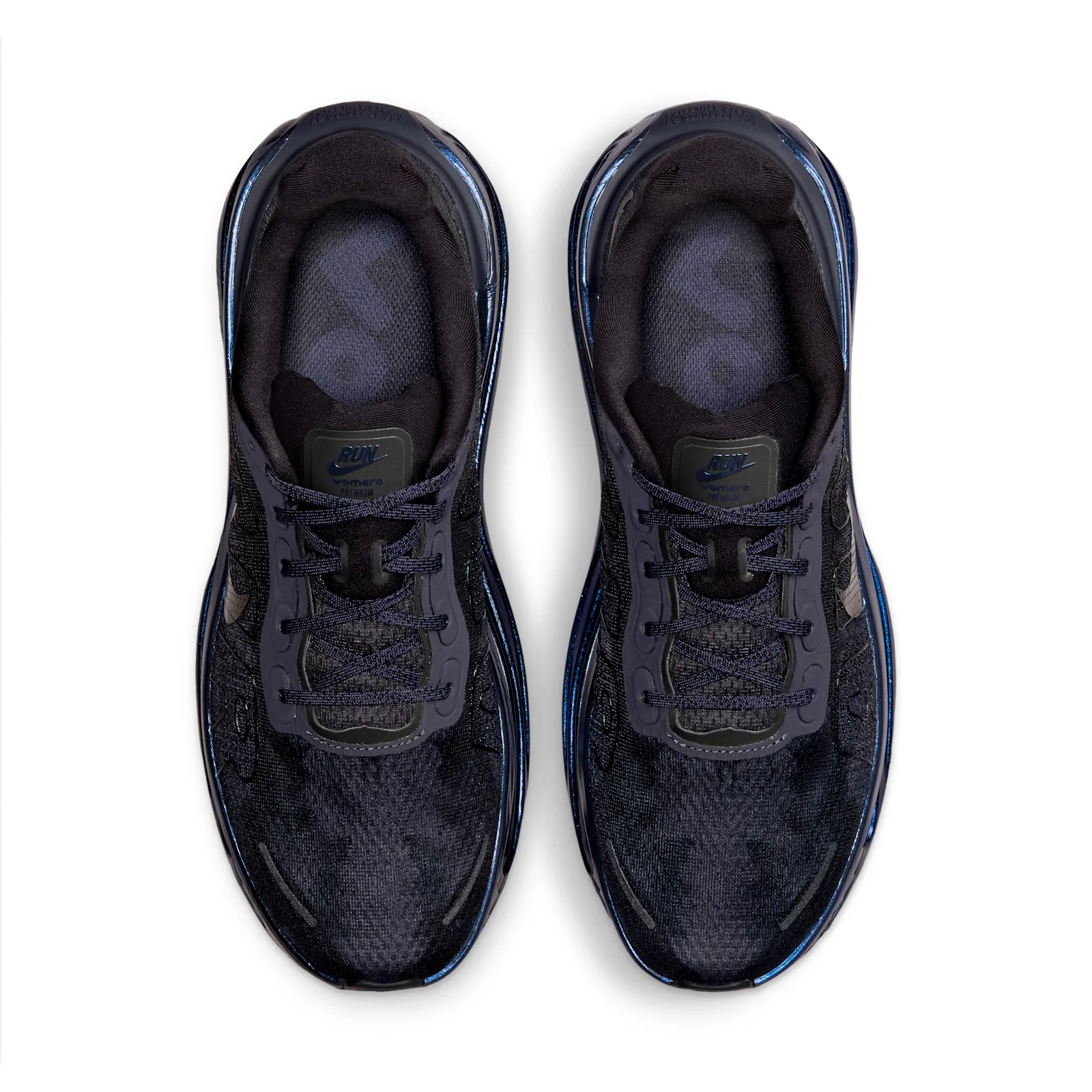 Top-down view of a pair, dark navy mesh uppers, crossed navy laces and RUN tongue label, Gridiron