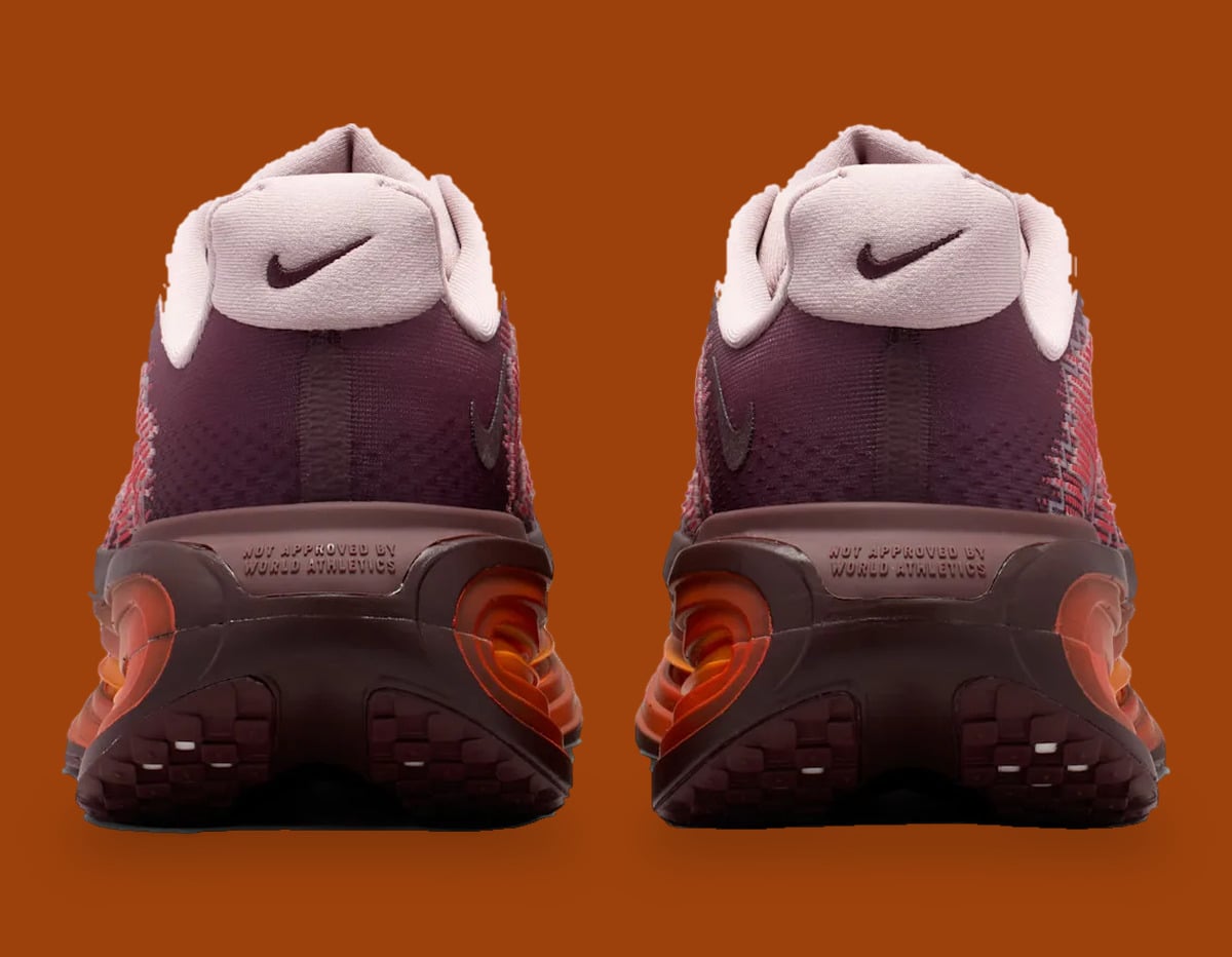 Heel view of pair, pale pink collars with Nike swoosh, orange Air units, Shanghai