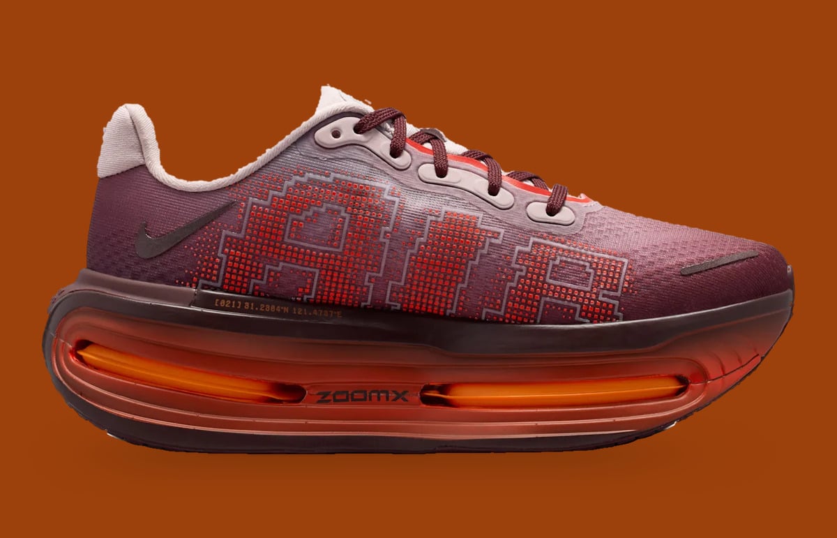 Lateral view, red pixel AIR lettering, orange heel Air unit marked ZoomX, Shanghai