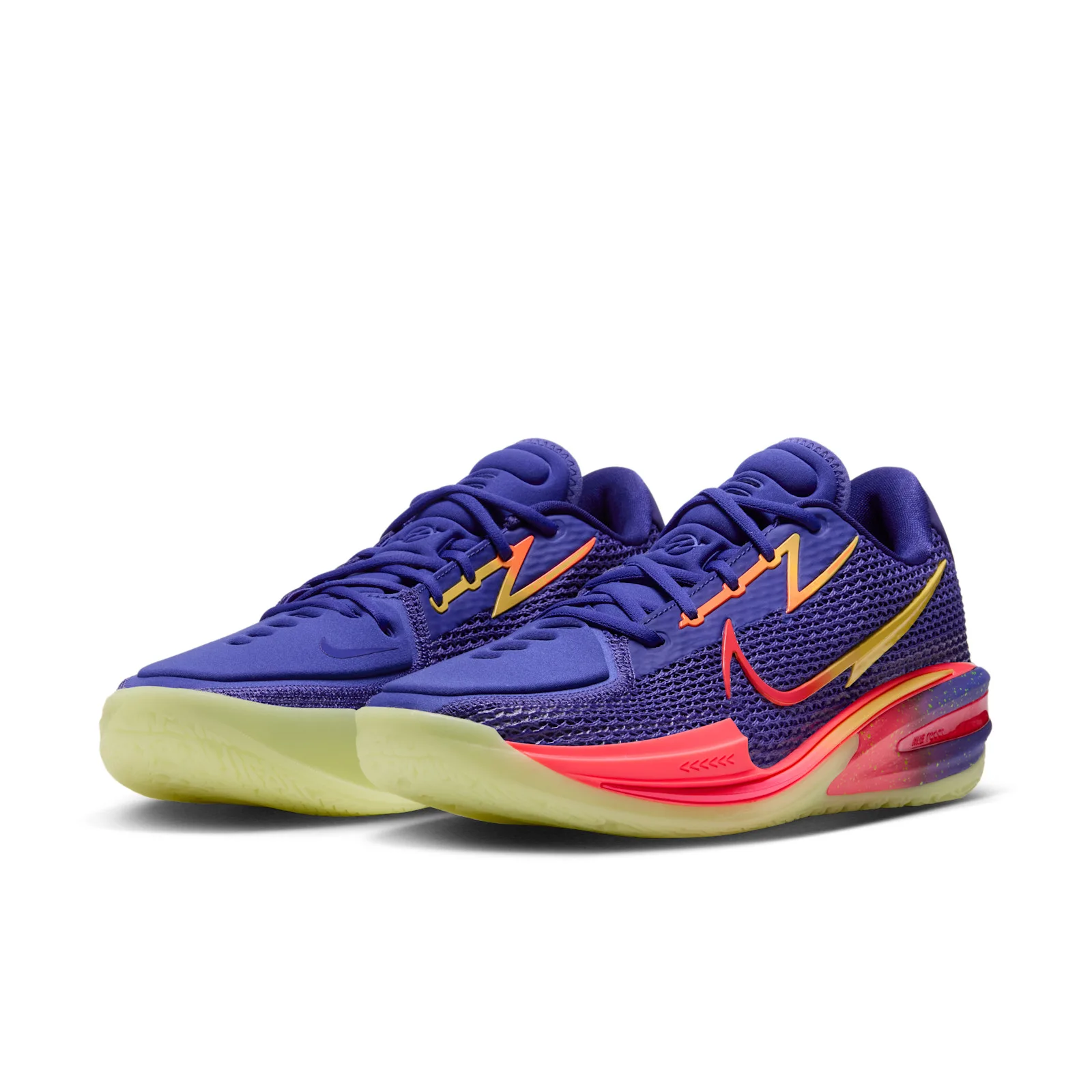 Pair at three-quarter angle on white, blue mesh, red-orange midsole, pale lime outsole, Purple Comet