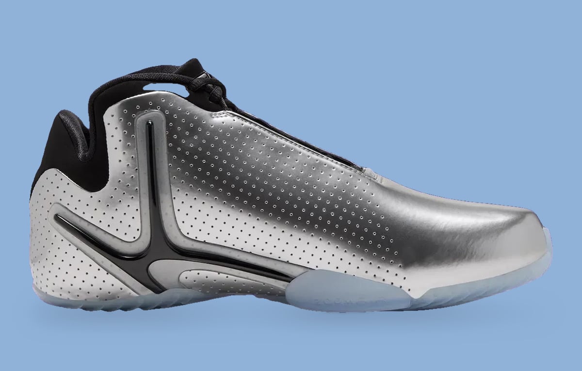 Medial view, perforated silver upper, black trim and icy blue sole, Platinum